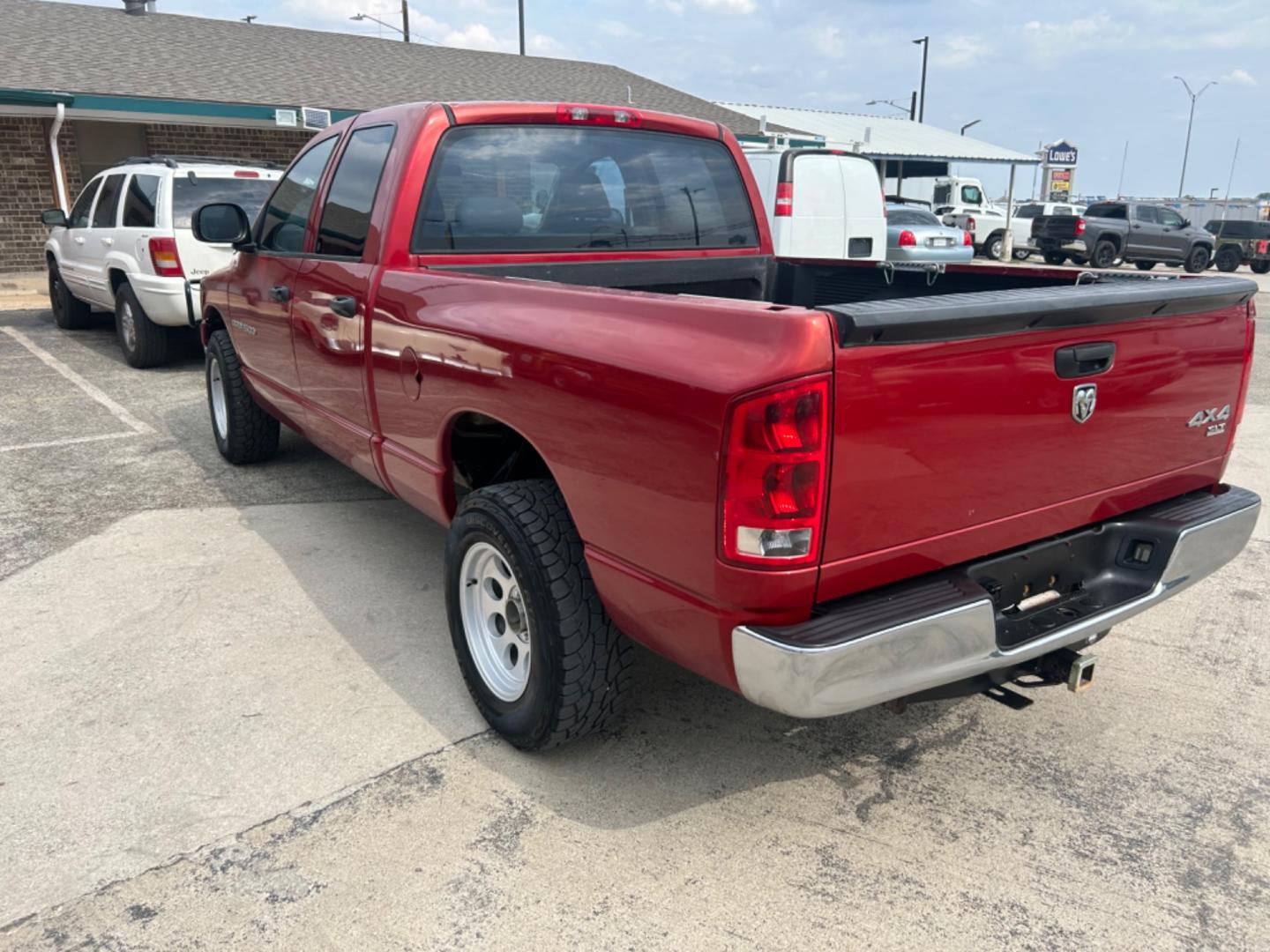 2006 Red /Beige Dodge Ram 1500 (1D7HU18N36S) with an 4.7L V8 F OHV engine, Automatic transmission, located at 1687 Business 35 S, New Braunfels, TX, 78130, (830) 625-7159, 29.655487, -98.051491 - Photo#1